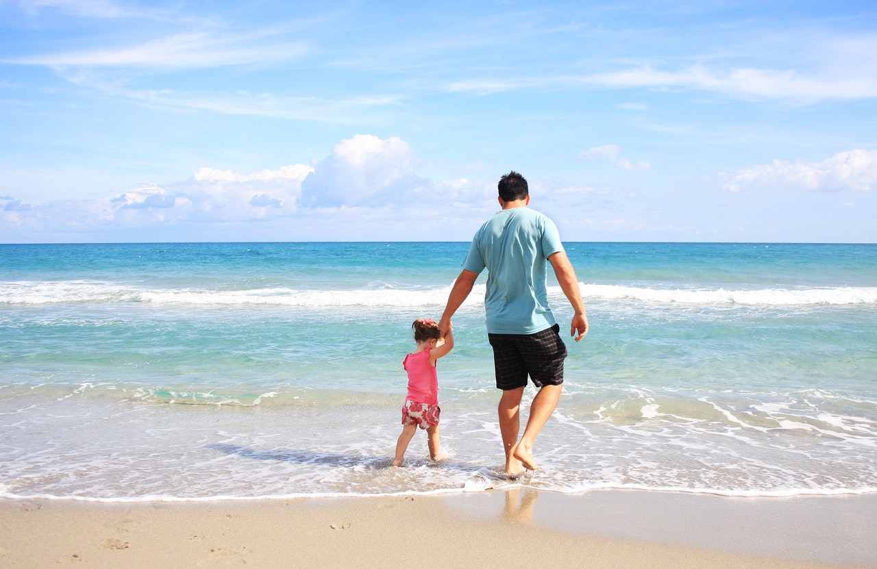 parental testing, who's the daddy, walking on beach with child